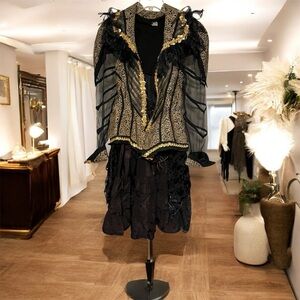 Handmade jacket with bustle